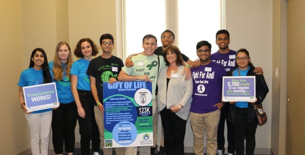 Students from George Washington H.S. with teacher and kidney transplant recipient, Andrea Seitchik