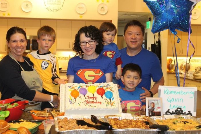 The Leong Family serves dinner for guests at Gift of Life Family House through the Home Cook Heroes Program