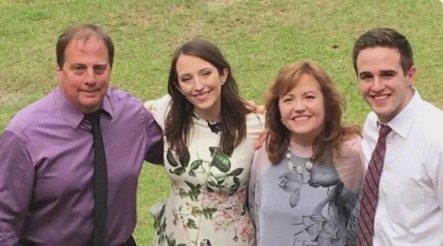 John Evans and his family poses for a picture.