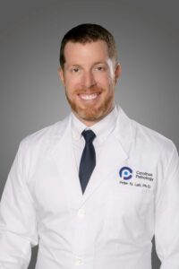 A man poses for a photo.