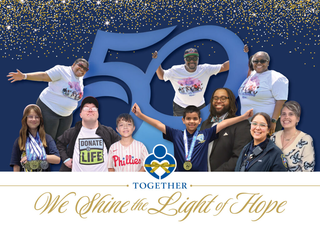 Transplant recipients and donor families smile on the Gift of Life Donor Program holiday card.