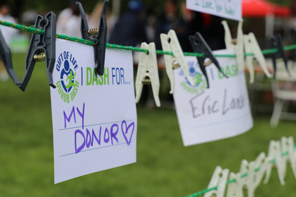 Tributes to organ donors hang on a clothesline at the Donor Dash.