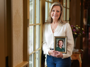 Melanie Penna holds a portrait of her late son and organ donor Anthony.