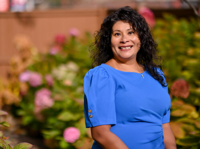 Kidney and liver recipient Jessica Gonzales smiles when posing for a picture.